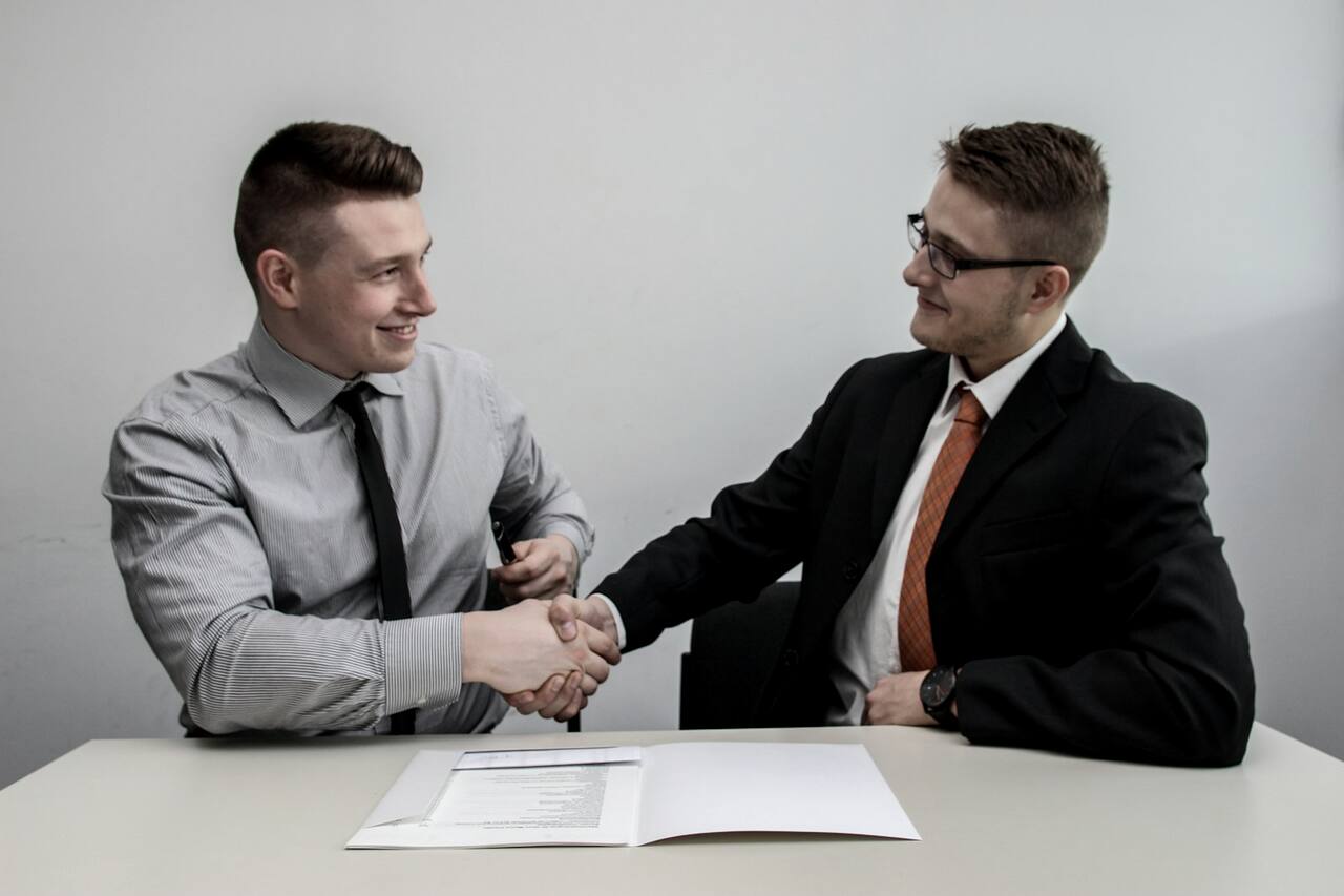 A partner in conversation with a prospective client