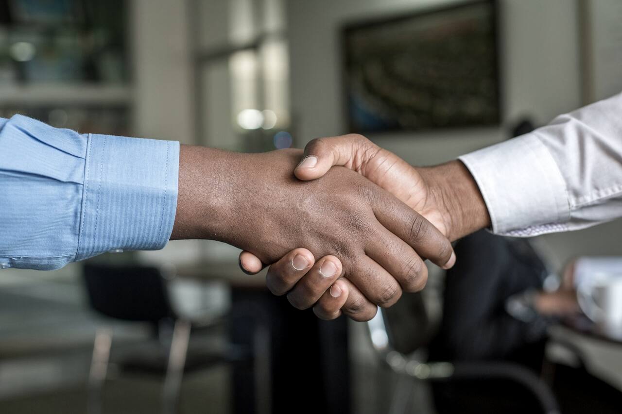 A handshake closing the deal